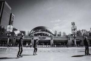 March 4 2023. Chicago, Illinois. People skate on a skating rink in downtown Chicago. photo