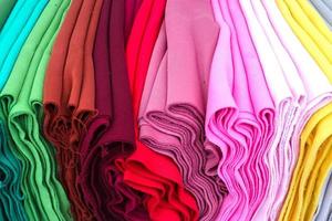 View on samples of cloth and fabrics in different colors found at a german fabrics market. photo
