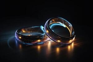 Two wedding rings made of light and energy created with technology. photo