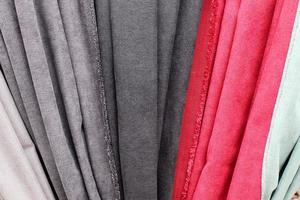 View on samples of cloth and fabrics in different colors found at a german fabrics market. photo