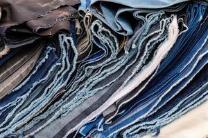 View on samples of cloth and fabrics in different colors found at a german fabrics market. photo