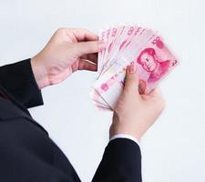 contando yuan o Rmb, chino moneda foto