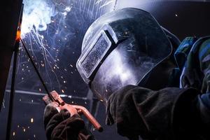 Arc welding of a steel in construction site photo