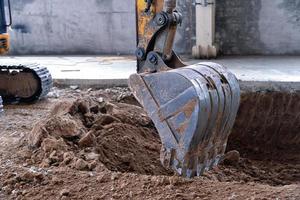 Working Excavator Tractor Digging photo