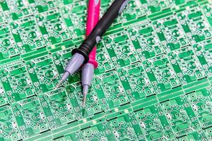 Digital multimeter on ESD table photo