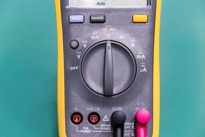 Digital multimeter on ESD table photo