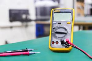 Digital multimeter on ESD table photo