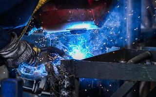 Arc welding of a steel in factory photo