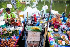 SONGKHLA, THAILAND, April 15, 2018, Sellers sell food and souvenirs at Klonghae Floating Market in Hat Yai, Thailand. The First floating Market in the South of Thailand. photo