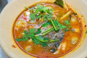 Thai spicy dish of Tom Yum Goong photo