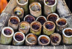 Glutinous rice roasted in bamboo joints photo