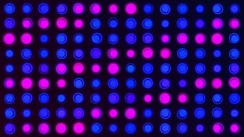 sencillo vistoso estampado movimiento antecedentes animación con brillante rosado y azul neón de colores puntos y círculos o LED luces. video