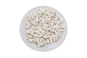 Popcorn on white plate on white background photo