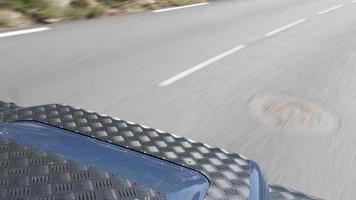 a camera attached to the side of an off road vehicle driving on rough tracks in sardinia, italy video