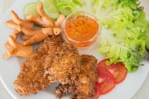 Fried Chicken with sausage and vegetable photo