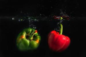 The colorful capsicum or bellpepper in the water photo