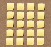 yellow sticky notes on sand board. photo