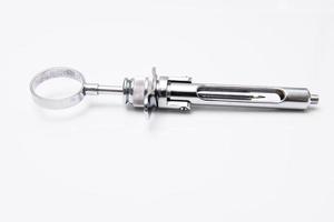 hypodermic syringe for dental clinic photo