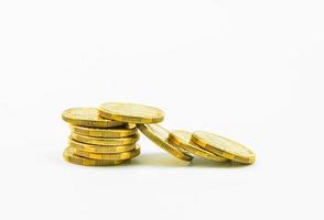 Gold Coins isolated on white photo