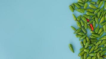 pile of green cayenne pepper with copy space for background photo