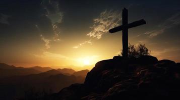 Mountain Majesty Artistic Silhouette of Crucifix Cross Against Sunset Sky photo