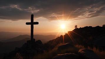 Mountain Majesty Artistic Silhouette of Crucifix Cross Against Sunset Sky photo