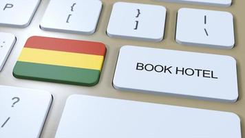 libro hotel en bolivia con sitio web en línea. botón en computadora teclado. viaje concepto 3d animación. libro hotel texto y nacional bandera. 3d ilustración foto