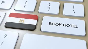 Book hotel in Egypt with website online. Button on computer keyboard. Travel concept 3D animation. Book hotel text and national flag. 3D illustration photo