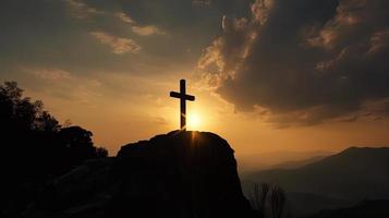 Mountain Majesty Artistic Silhouette of Crucifix Cross Against Sunset Sky photo