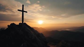 Mountain Majesty Artistic Silhouette of Crucifix Cross Against Sunset Sky photo