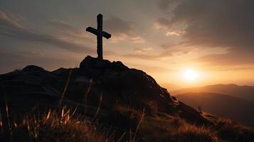 Mountain Majesty Artistic Silhouette of Crucifix Cross Against Sunset Sky photo