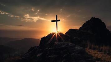 Mountain Majesty Artistic Silhouette of Crucifix Cross Against Sunset Sky photo