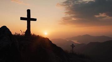 Mountain Majesty Artistic Silhouette of Crucifix Cross Against Sunset Sky photo