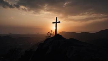 Mountain Majesty Artistic Silhouette of Crucifix Cross Against Sunset Sky photo