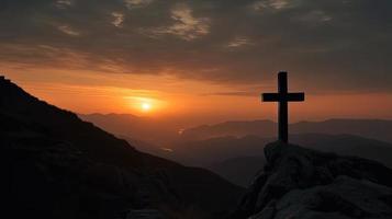 Mountain Majesty Artistic Silhouette of Crucifix Cross Against Sunset Sky photo