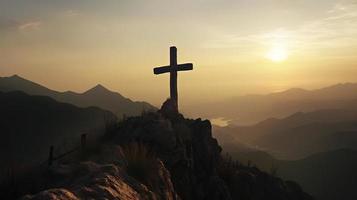 Mountain Majesty Artistic Silhouette of Crucifix Cross Against Sunset Sky photo