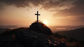 Mountain Majesty Artistic Silhouette of Crucifix Cross Against Sunset Sky photo