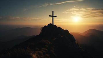 Mountain Majesty Artistic Silhouette of Crucifix Cross Against Sunset Sky photo