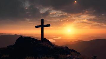 Mountain Majesty Artistic Silhouette of Crucifix Cross Against Sunset Sky photo