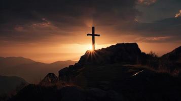 Mountain Majesty Artistic Silhouette of Crucifix Cross Against Sunset Sky photo