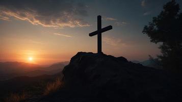 Mountain Majesty Artistic Silhouette of Crucifix Cross Against Sunset Sky photo