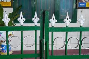 Typical decoration of iron fence kraton jogja palace Yogyakarta, Indonesia photo