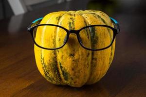 Blewah, Cantaloupe and glasses or Cucumis melo, a type of melon found in Indonesia, with a wooden background, cantaloupe is often used to make drinks during the fasting month of Ramadan photo