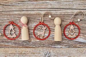 Christmas decorations on wooden background, Flat lay photo