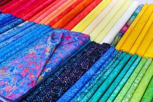View on samples of cloth and fabrics in different colors found at a german fabrics market. photo