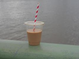 latte in plastic cup photo