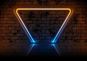 Blue orange neon triangle frame on dark grunge brick wall background vector