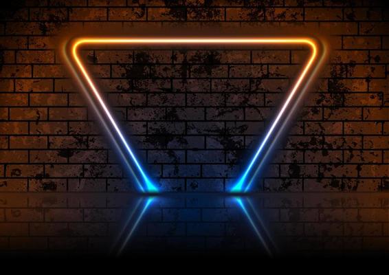 Blue orange neon triangle frame on dark grunge brick wall background