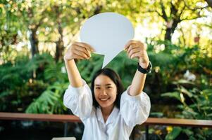 girl showing sign speech bubble photo