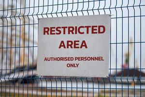 Restricted area, authorized personnel only, no trespassing photo